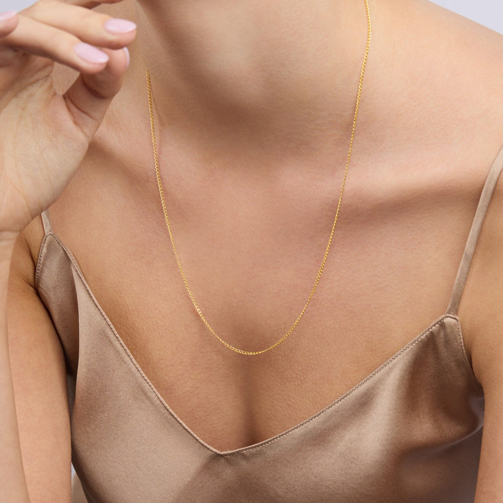 9kt Yellow Gold Diamond Cut Curb Necklace 55cm