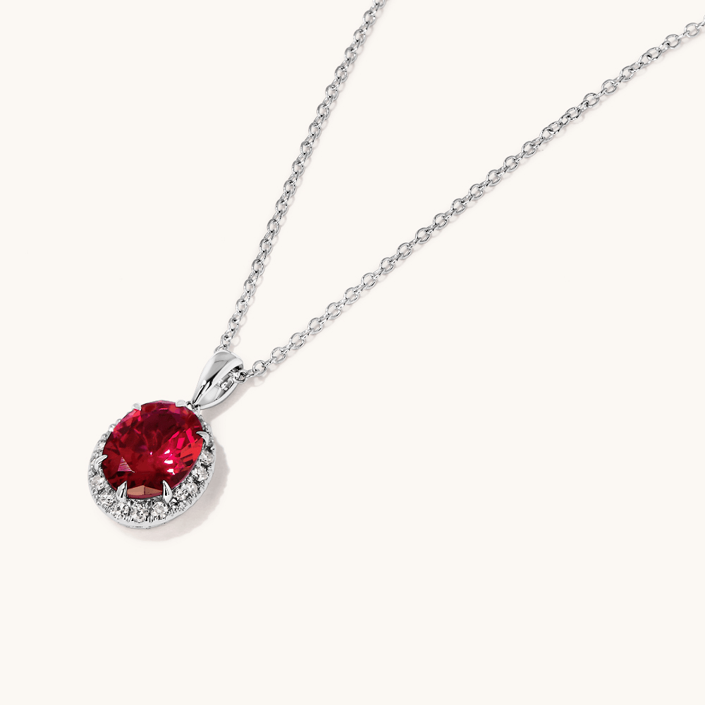 45cm Oval Created Ruby Necklace with 0.18tw of Laboratory-Grown Diamonds in Sterling Silver and Platinum