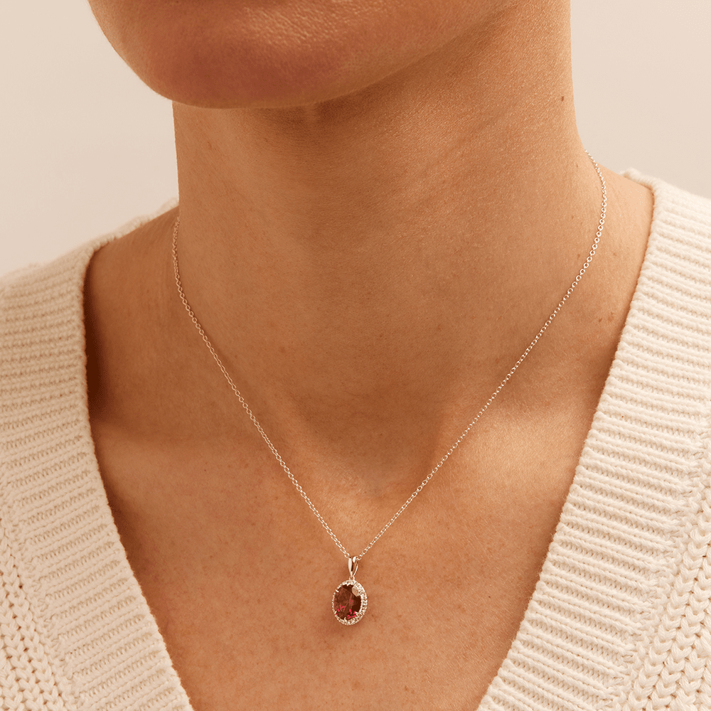 45cm Oval Created Ruby Necklace with 0.18tw of Laboratory-Grown Diamonds in Sterling Silver and Platinum